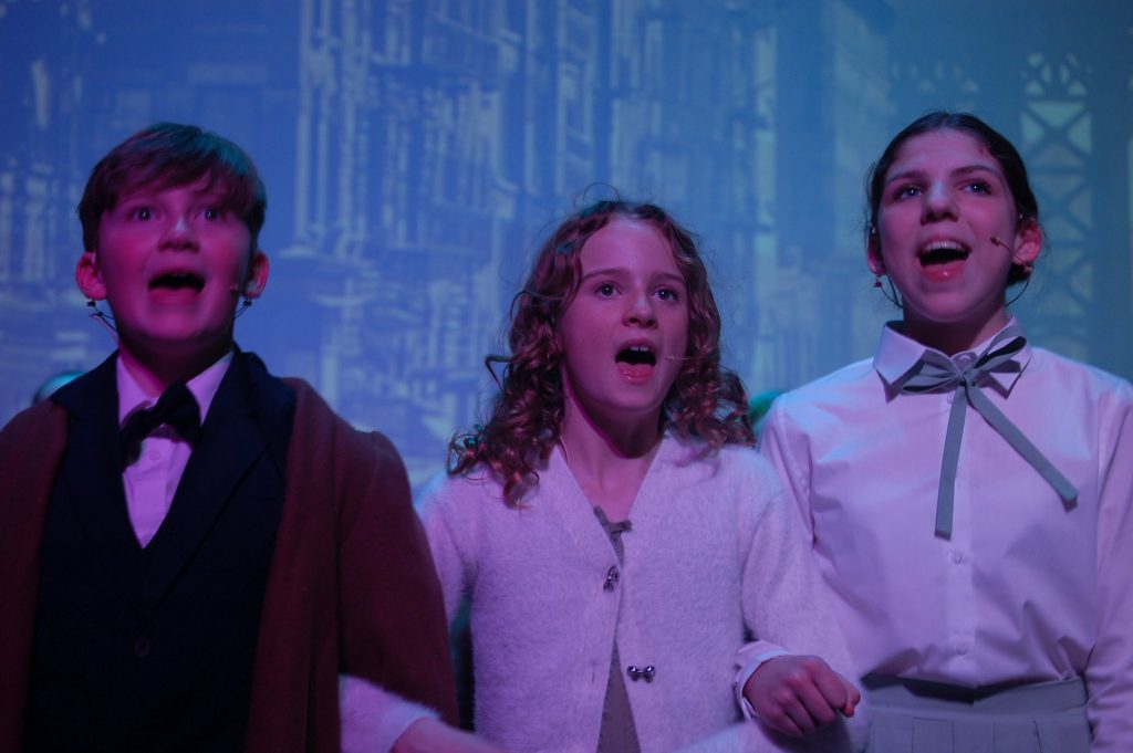 Students Shine on Stage in Annie Jr!